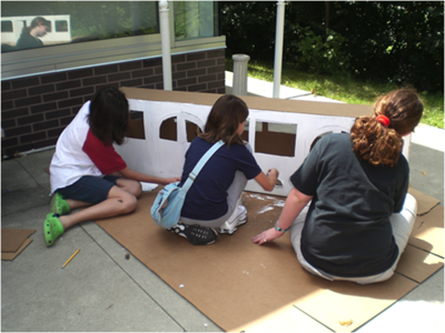 Girls working on people mover
